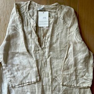 Beige linen dress with detailed hem from Italy